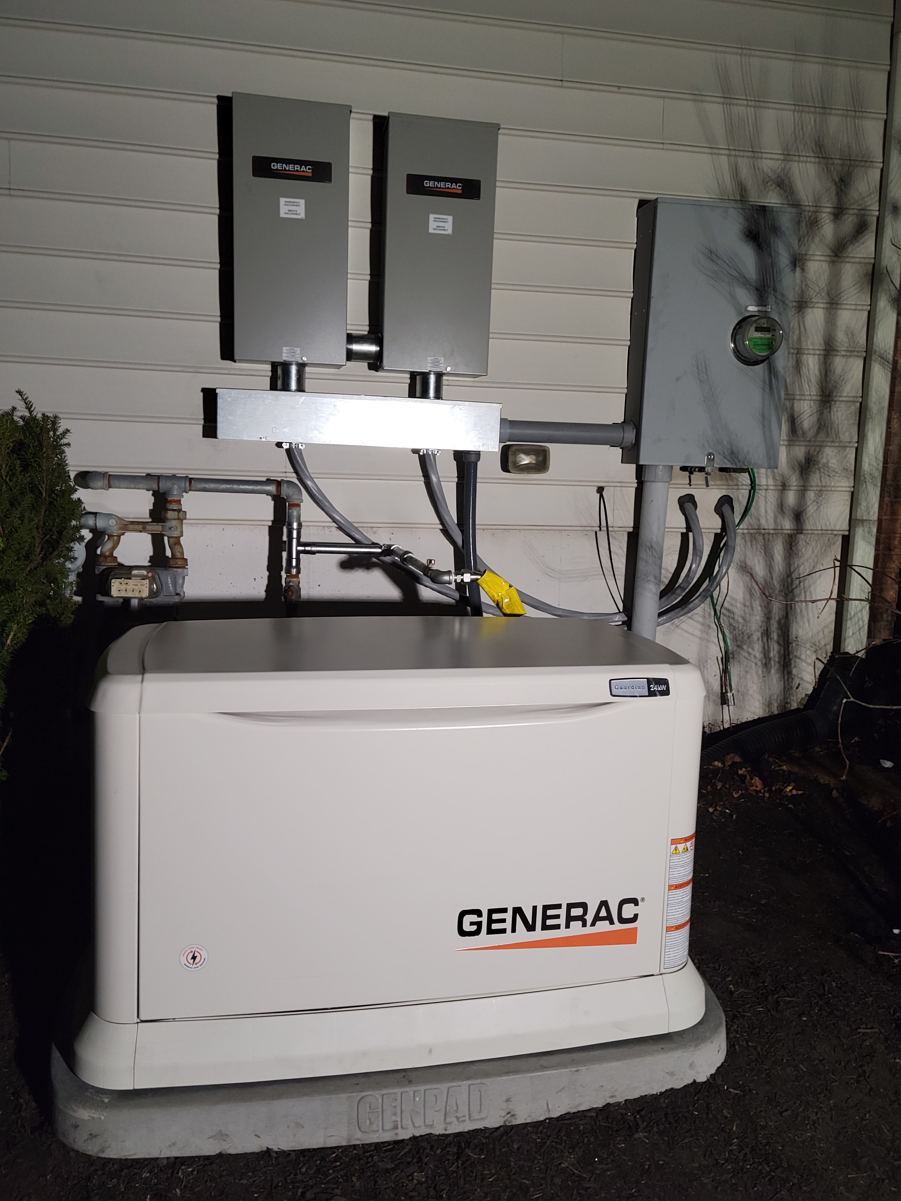 DMES LLC Generac standby generator installation with transfer switch and gas piping