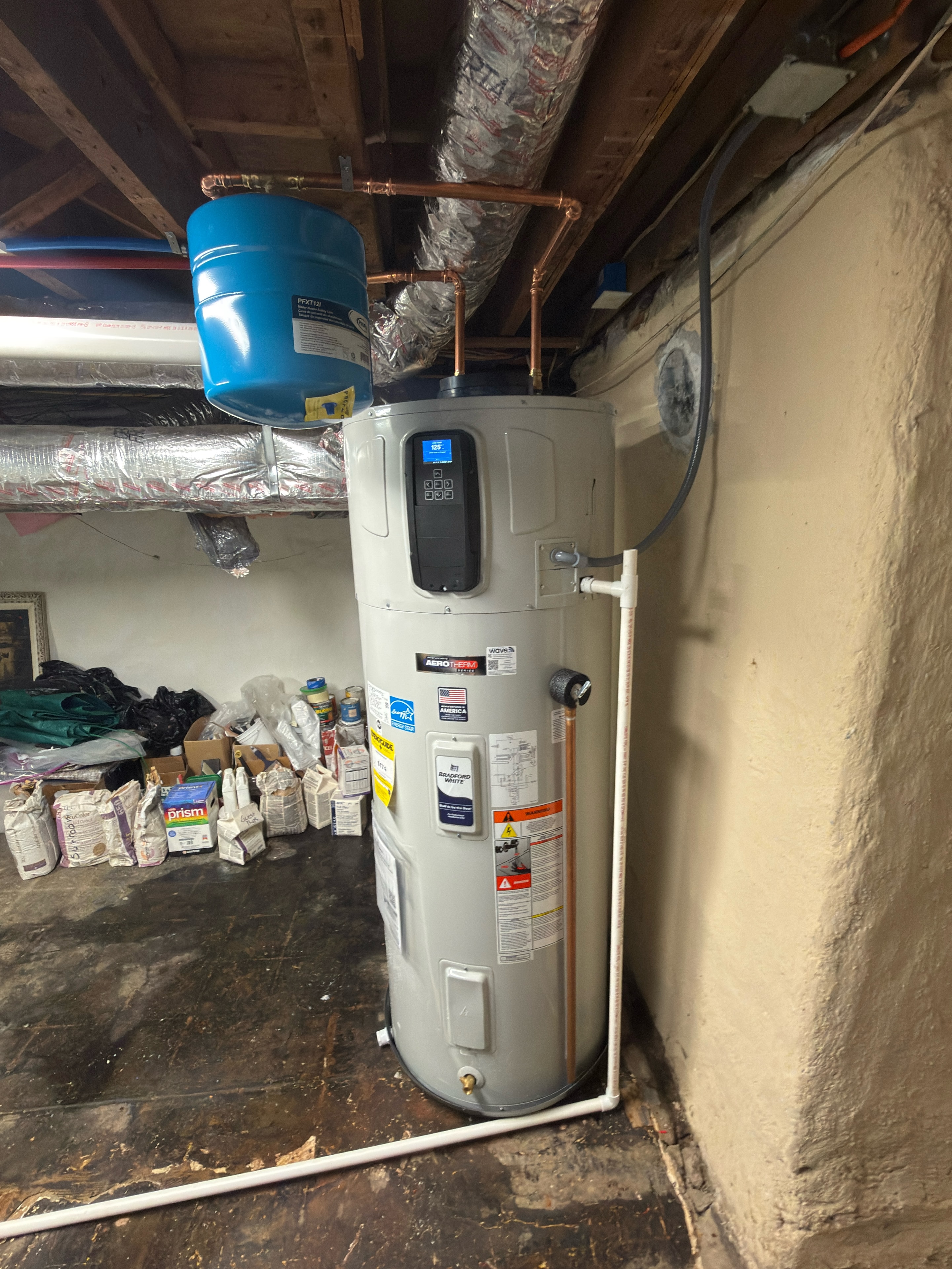 DMES LLC water heater tank installation with expansion tank and copper supply lines